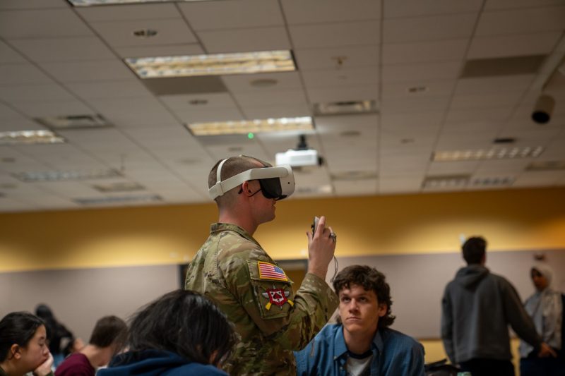 student using VR headset in classroom