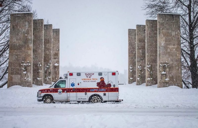 Virginia Tech Rescue Squad ambulance parked in front of the Pylons on a snow day.